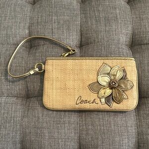 Coach Beige Wristlet with Gold Floral Design